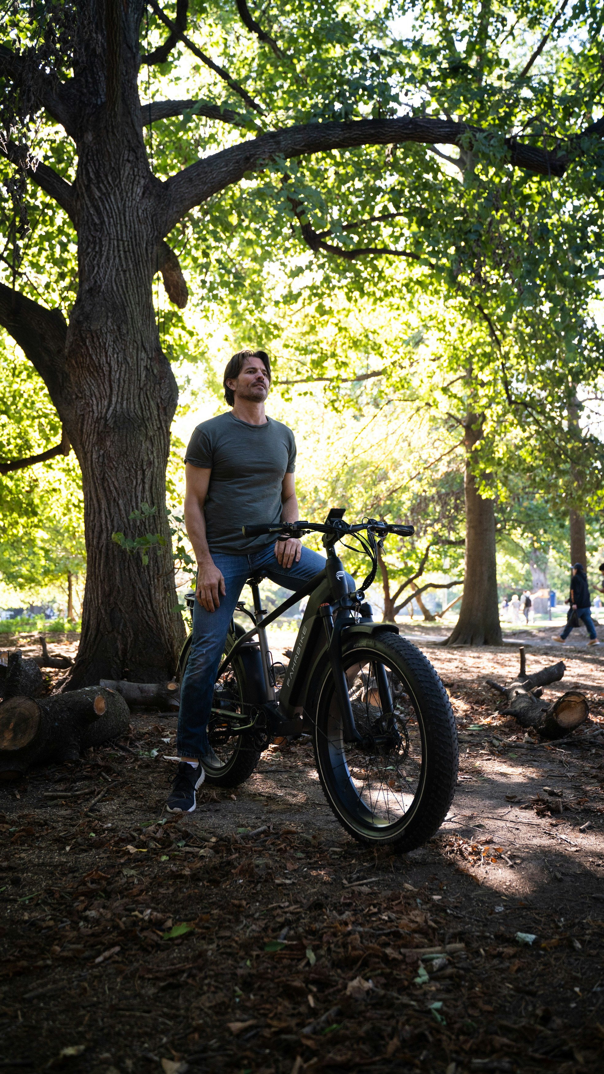 a person sitting on a bicycle