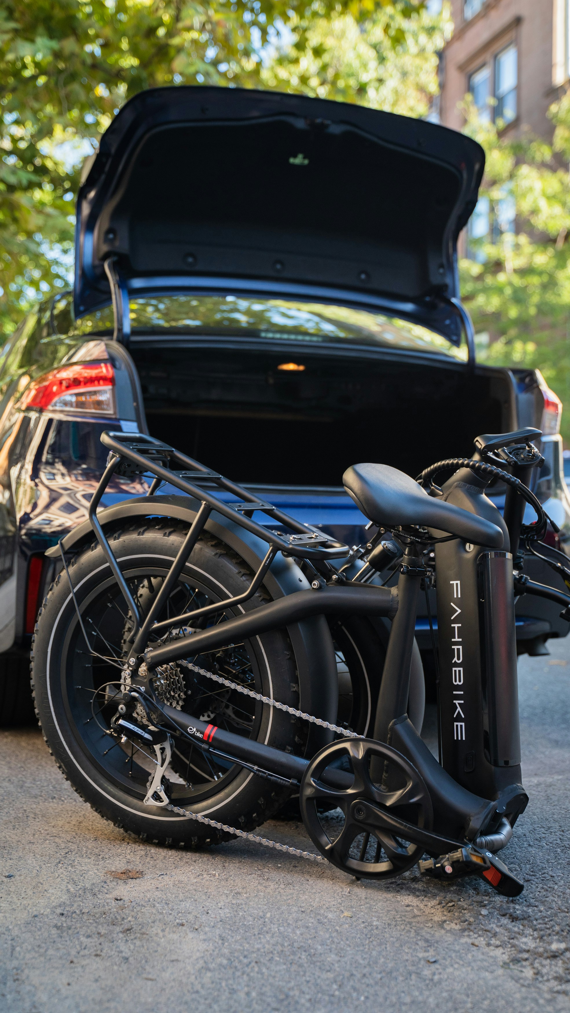 a motorcycle in the trunk of a car