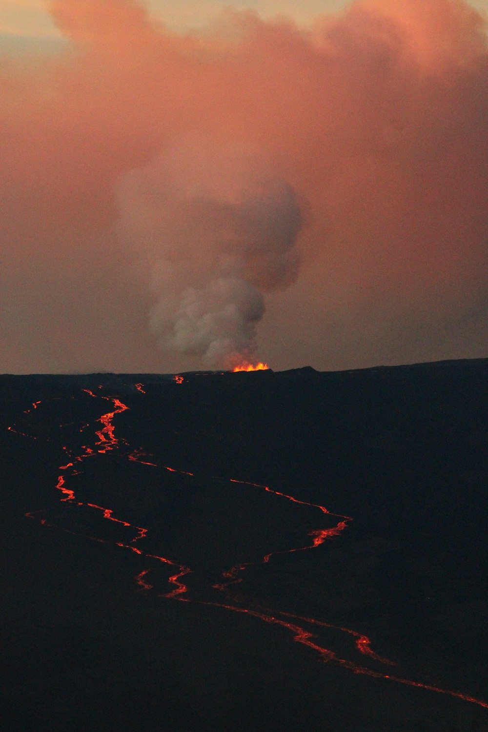 a large fire on a mountain