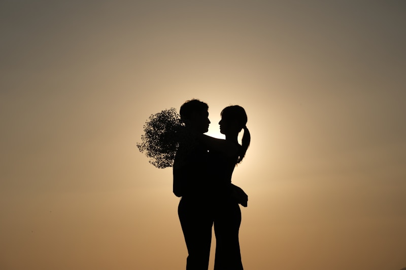 a man and woman kissing