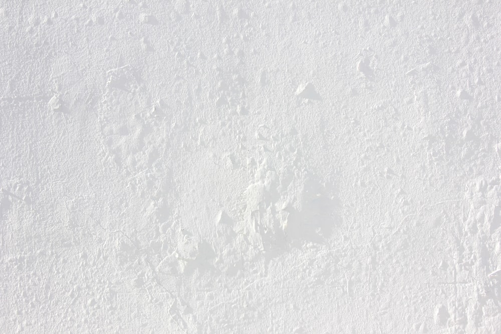 a white surface with a black background