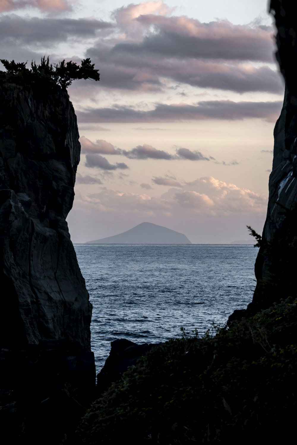 a view of the ocean from a cliff