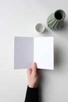 An open card revealing blank inner pages ready for heartfelt handwritten messages.
