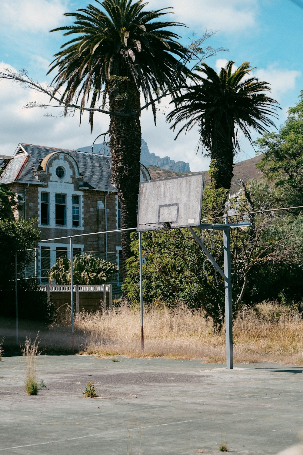 a basketball hoop in front of a house