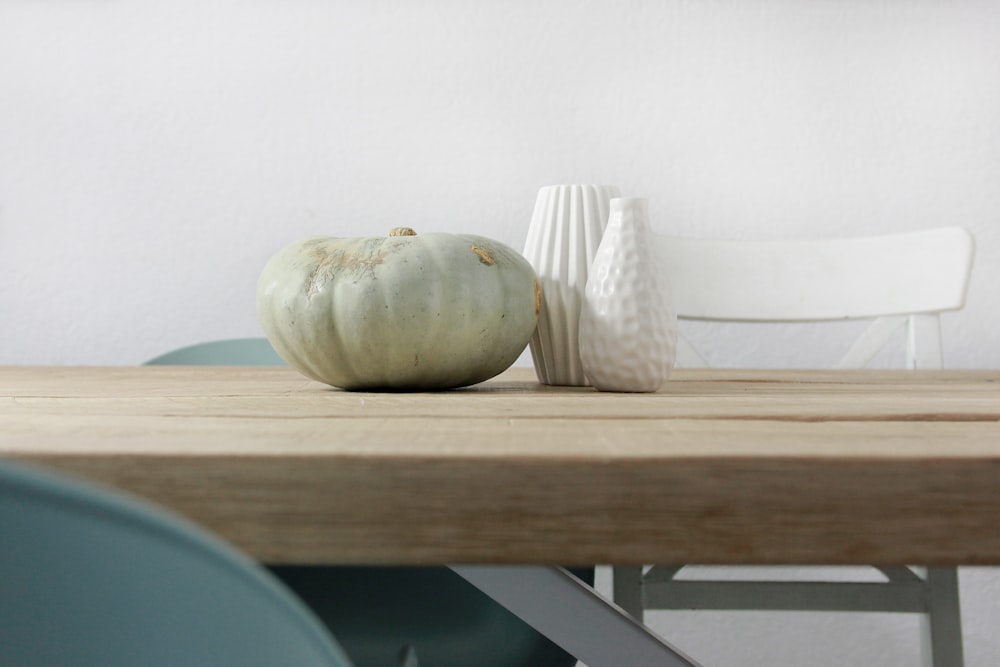 a bowl and a chair on a table