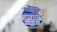 A sticker with a blue circular design features the text 'Superduty Motor Oil' along with the phrases 'Super Charged' and 'Established 1971.' A stylized wing and the number '71' are incorporated into the design.