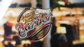 An elegant website layout for a barbershop showcasing services.