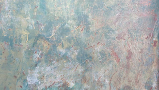 Close-up of textured paint strokes revealing rich layers and subtle color shifts.