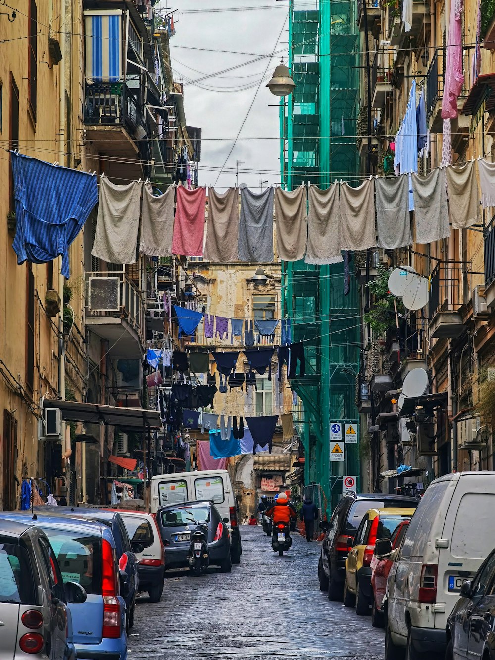 a street with cars and buildings