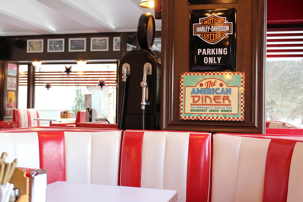 a restaurant with red chairs