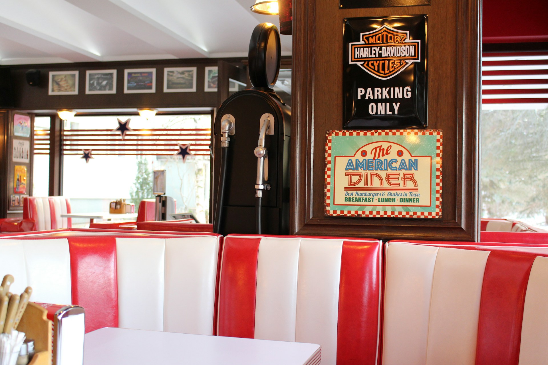 a restaurant with red chairs