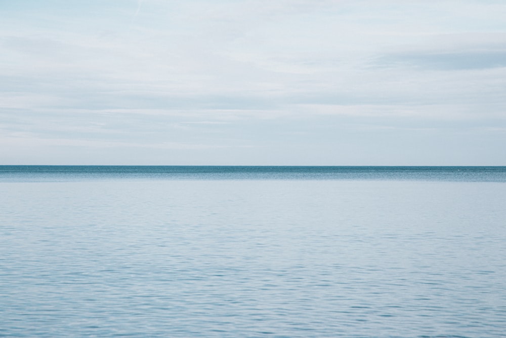 a body of water with a land in the distance