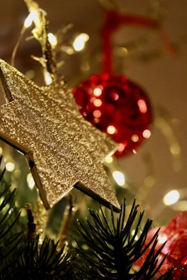 Close-up of a sparkling star ornament crafted from eco-friendly materials glowing softly.