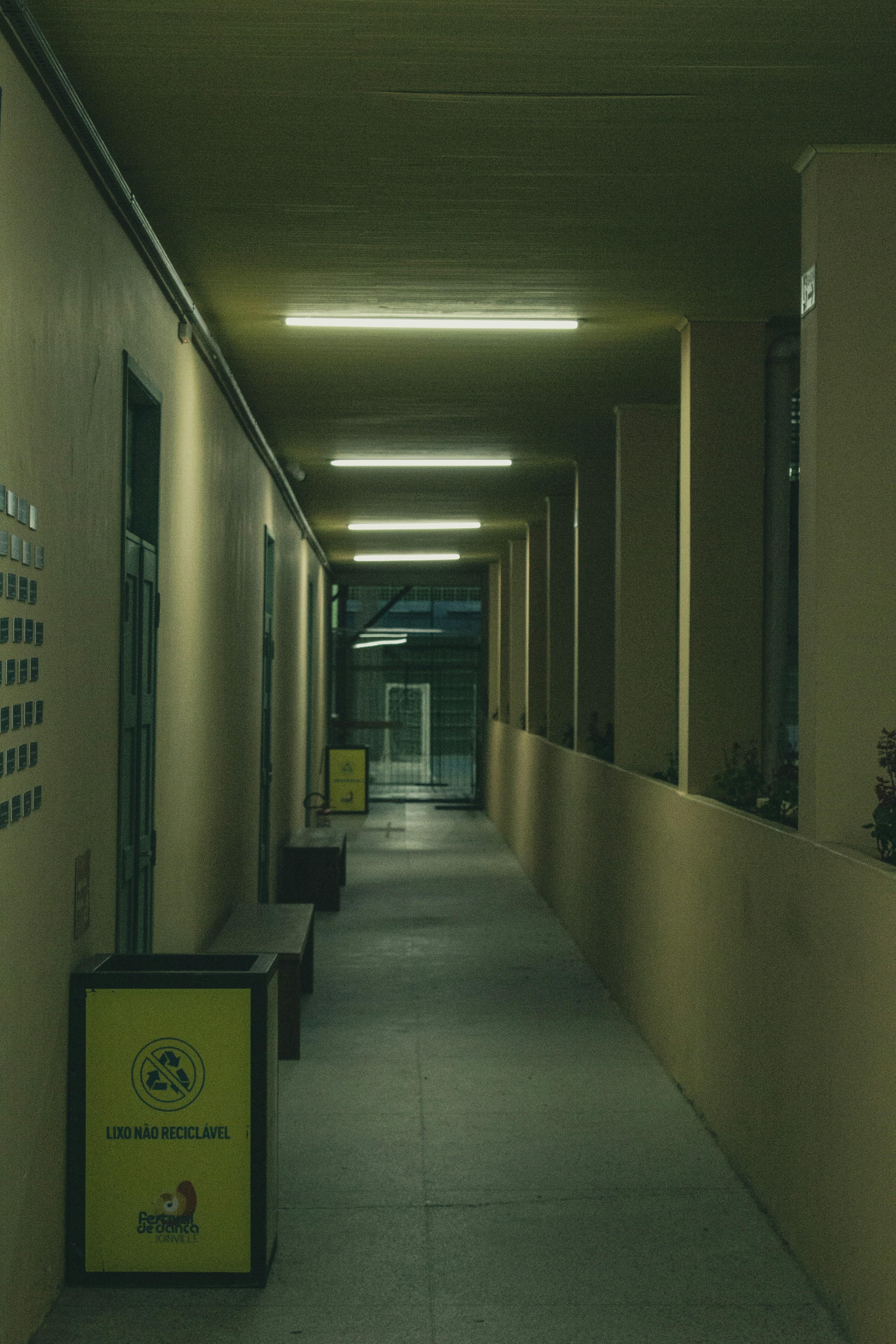 a hallway with a sign