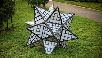 a solar panel on a grass field