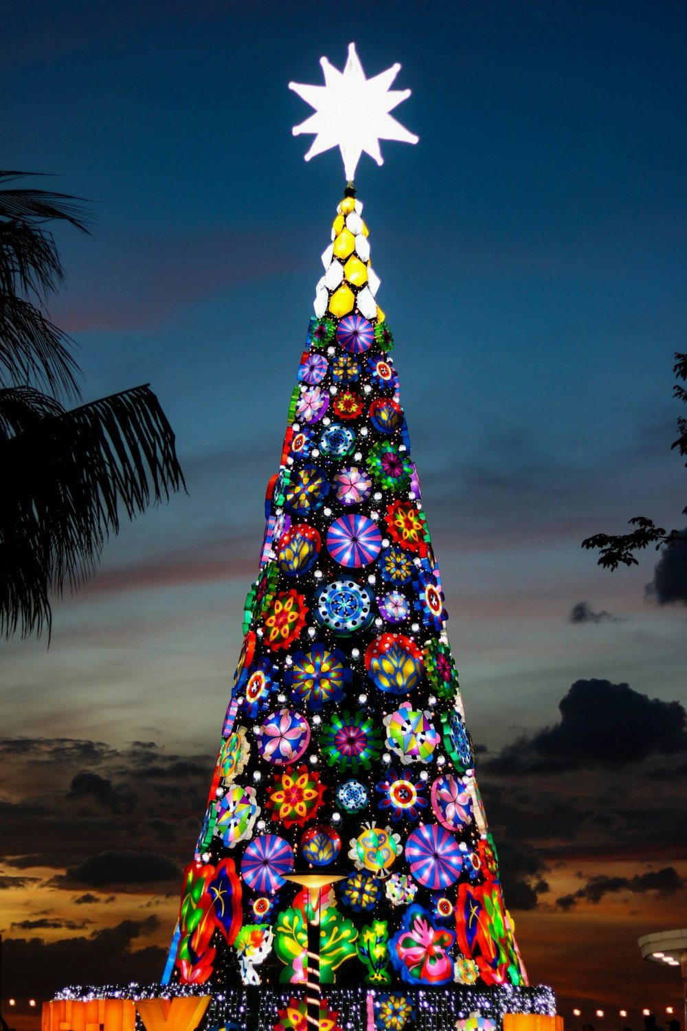 a large christmas tree with lights