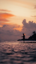 a person fishing in the water