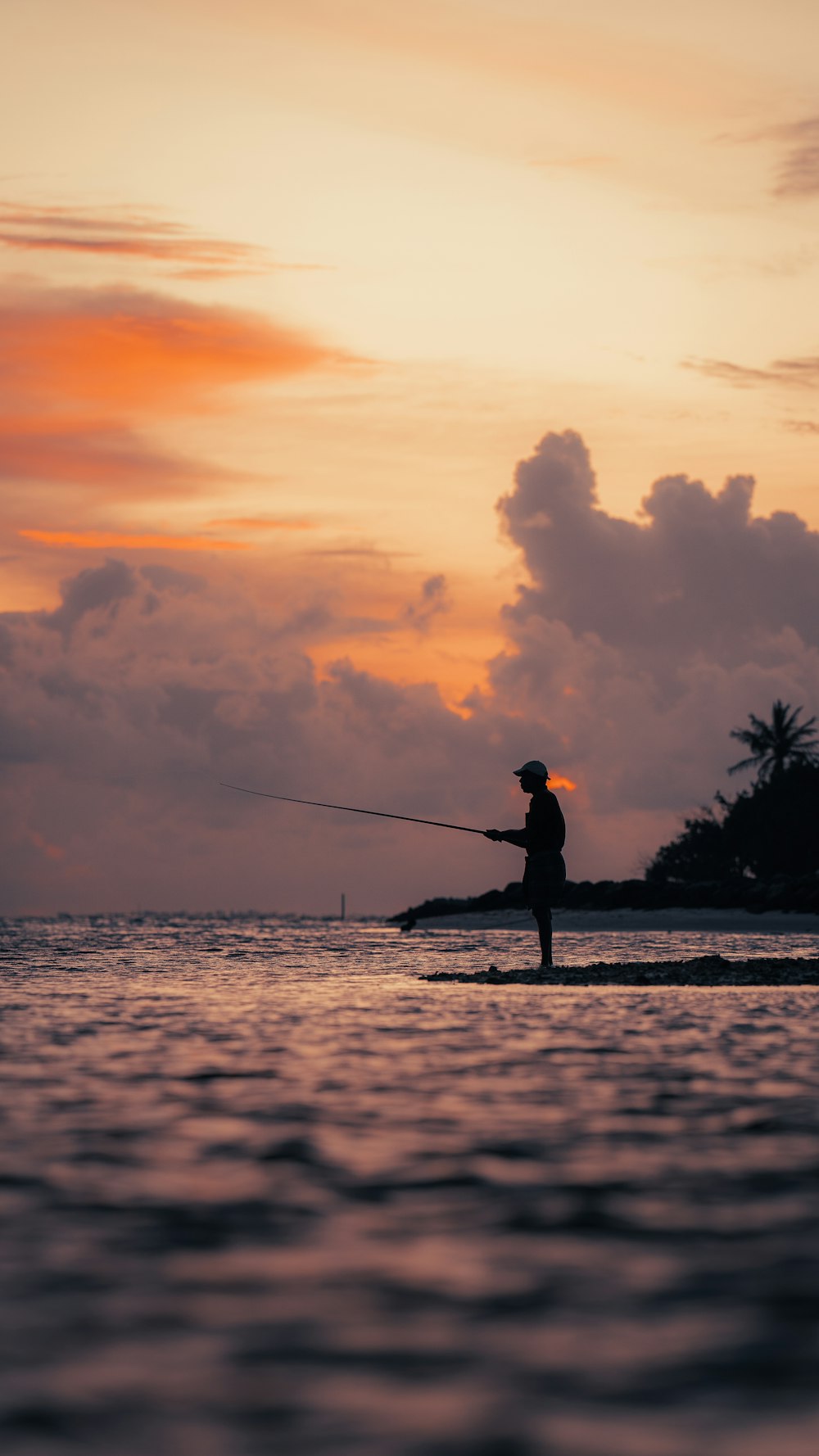 a person fishing in the water