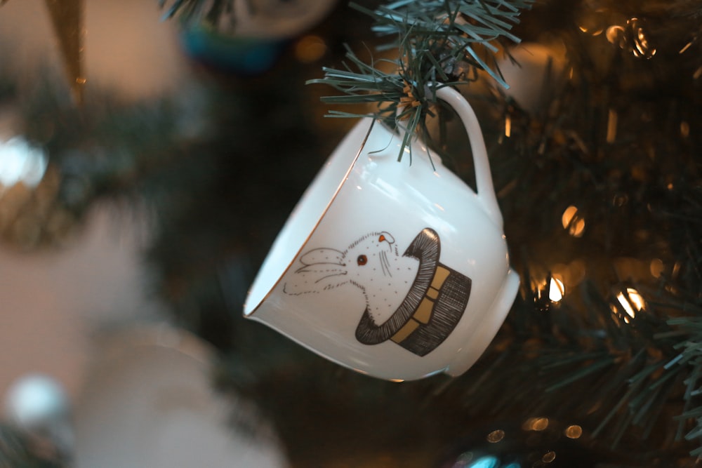 a white ornament on a tree