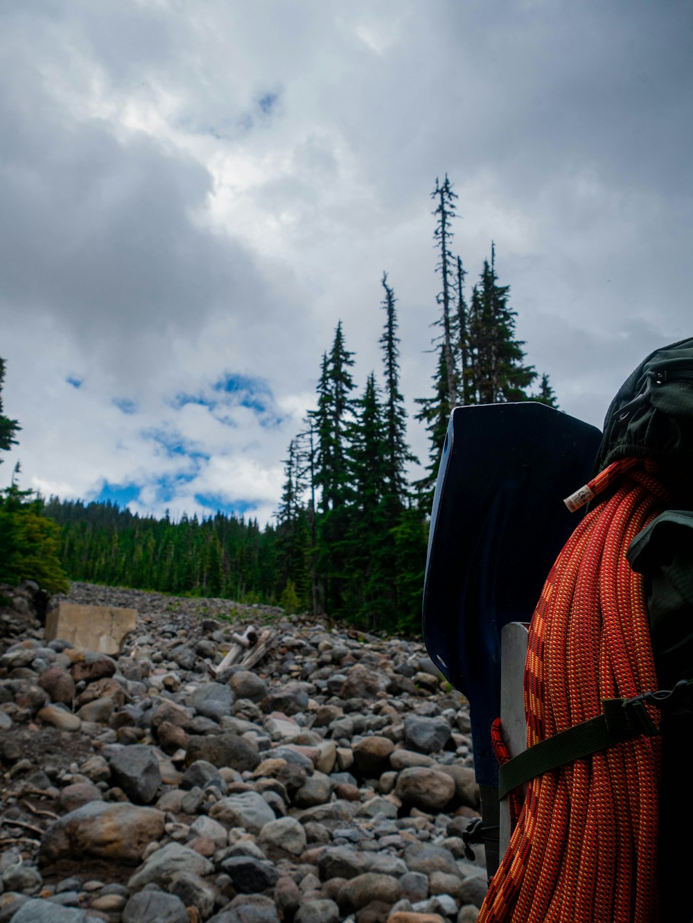 a person standing in a rocky area