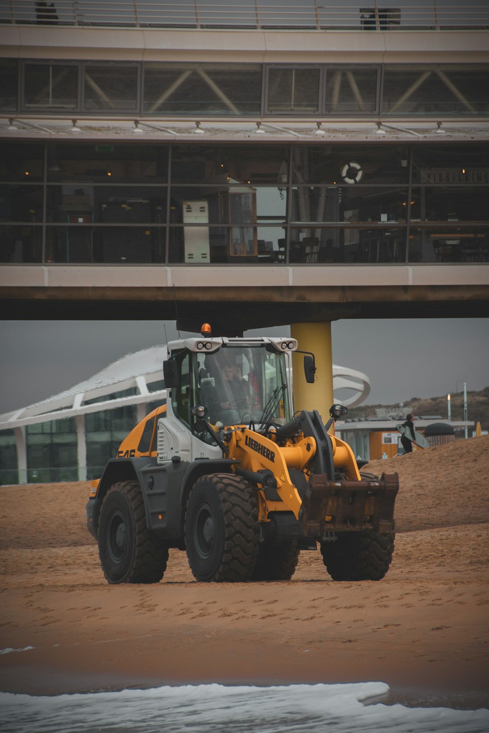 a tractor in front of a building