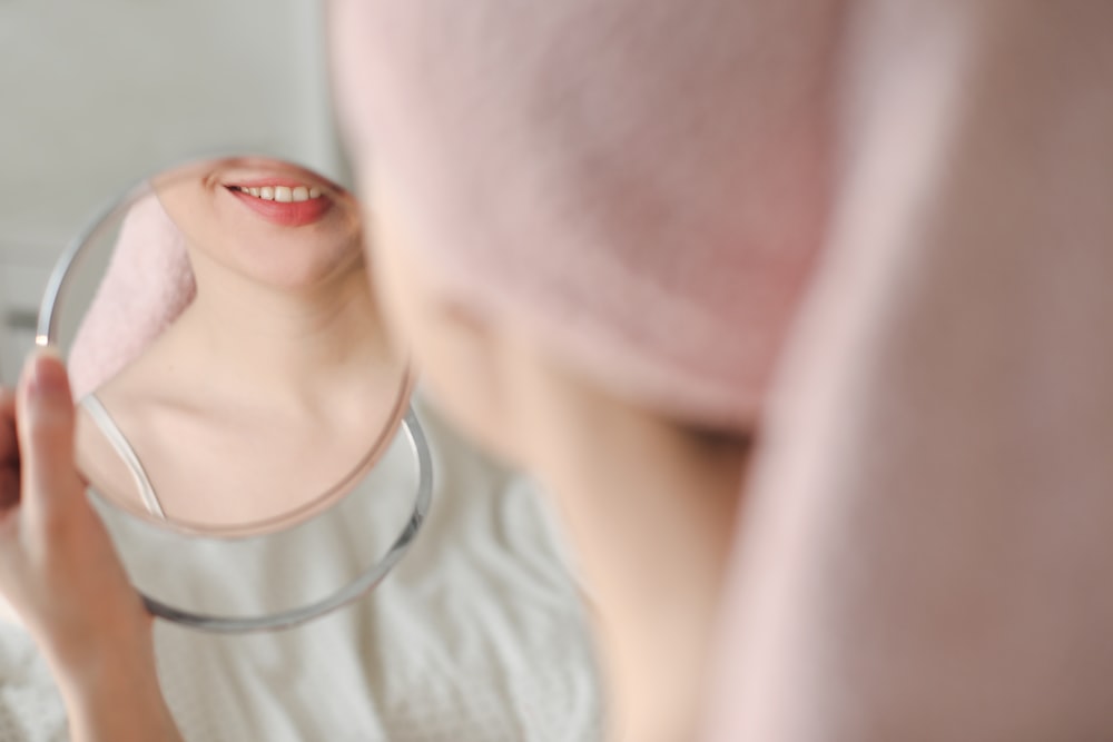 a woman wearing a white shirt