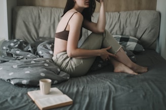 a woman sitting on a couch