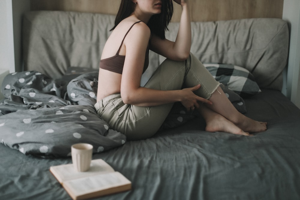 a woman sitting on a couch