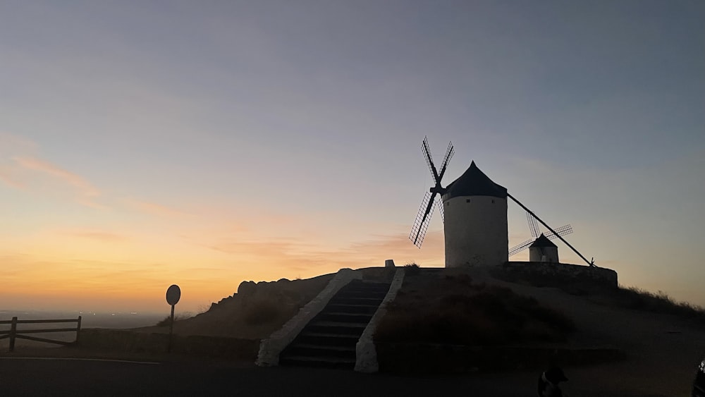 a windmill on a hill