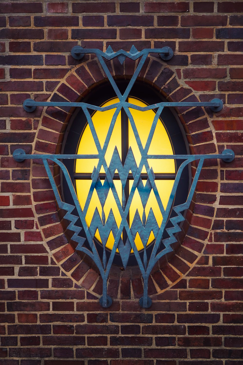 a blue and yellow stained glass window