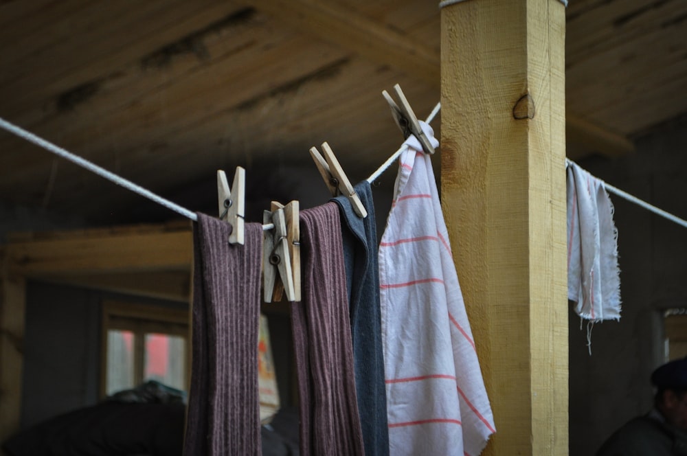 a group of clothes on a line in a room