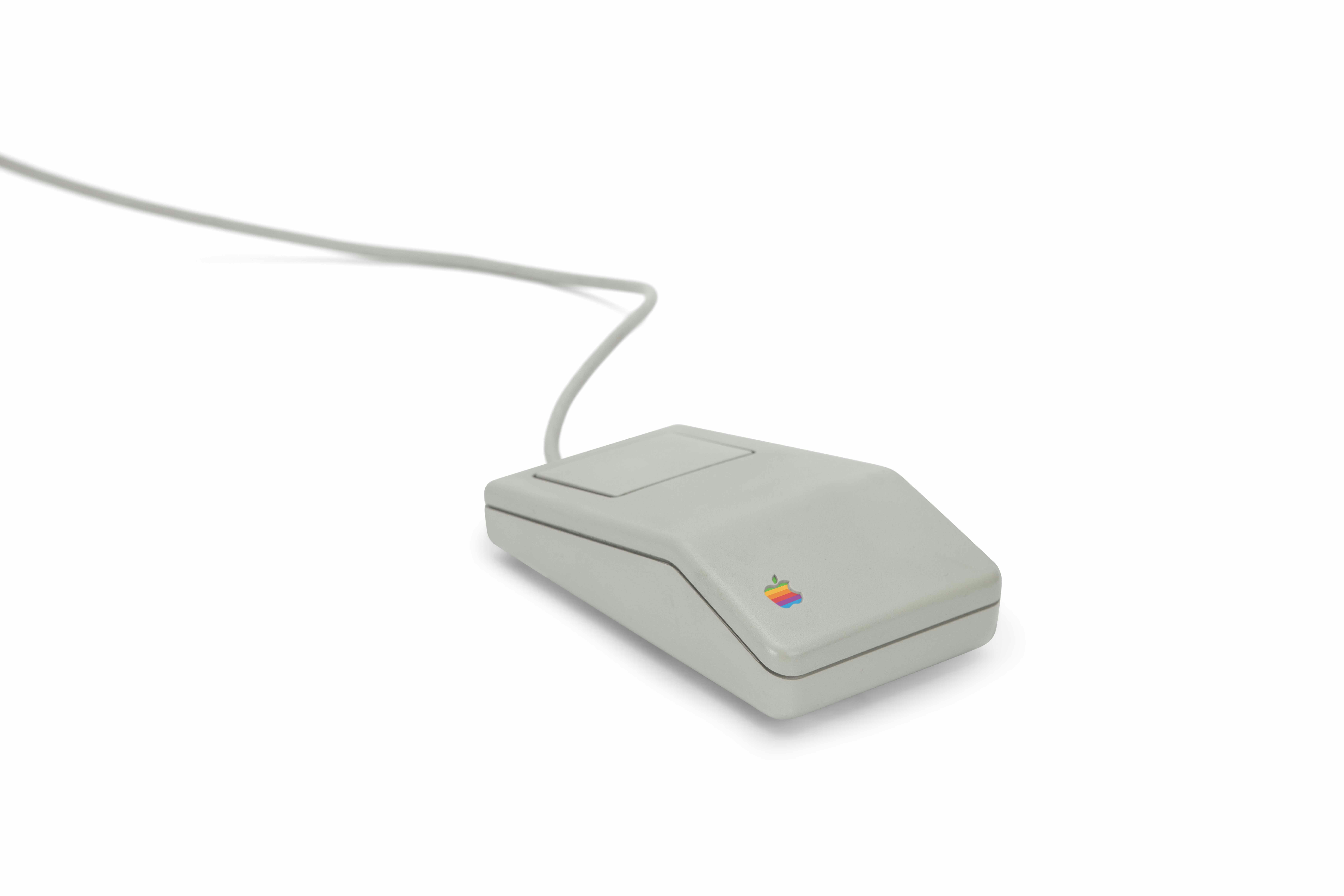 My 1992 iMac Classic Mouse, Enhanced with a rainbow logo.