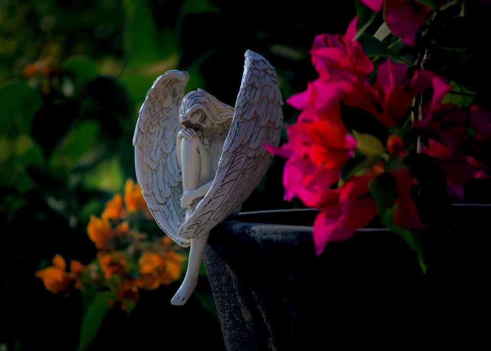 a bird perched on a post