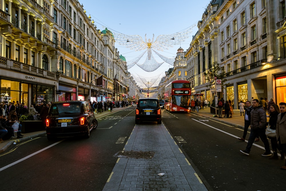 a busy street with cars and people