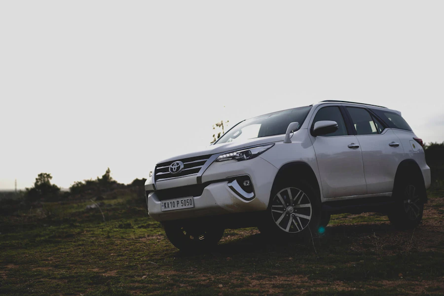 Toyota Hilux 4x4 bakkie parked on a dirt road in Namibia