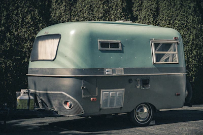 a silver trailer with a window