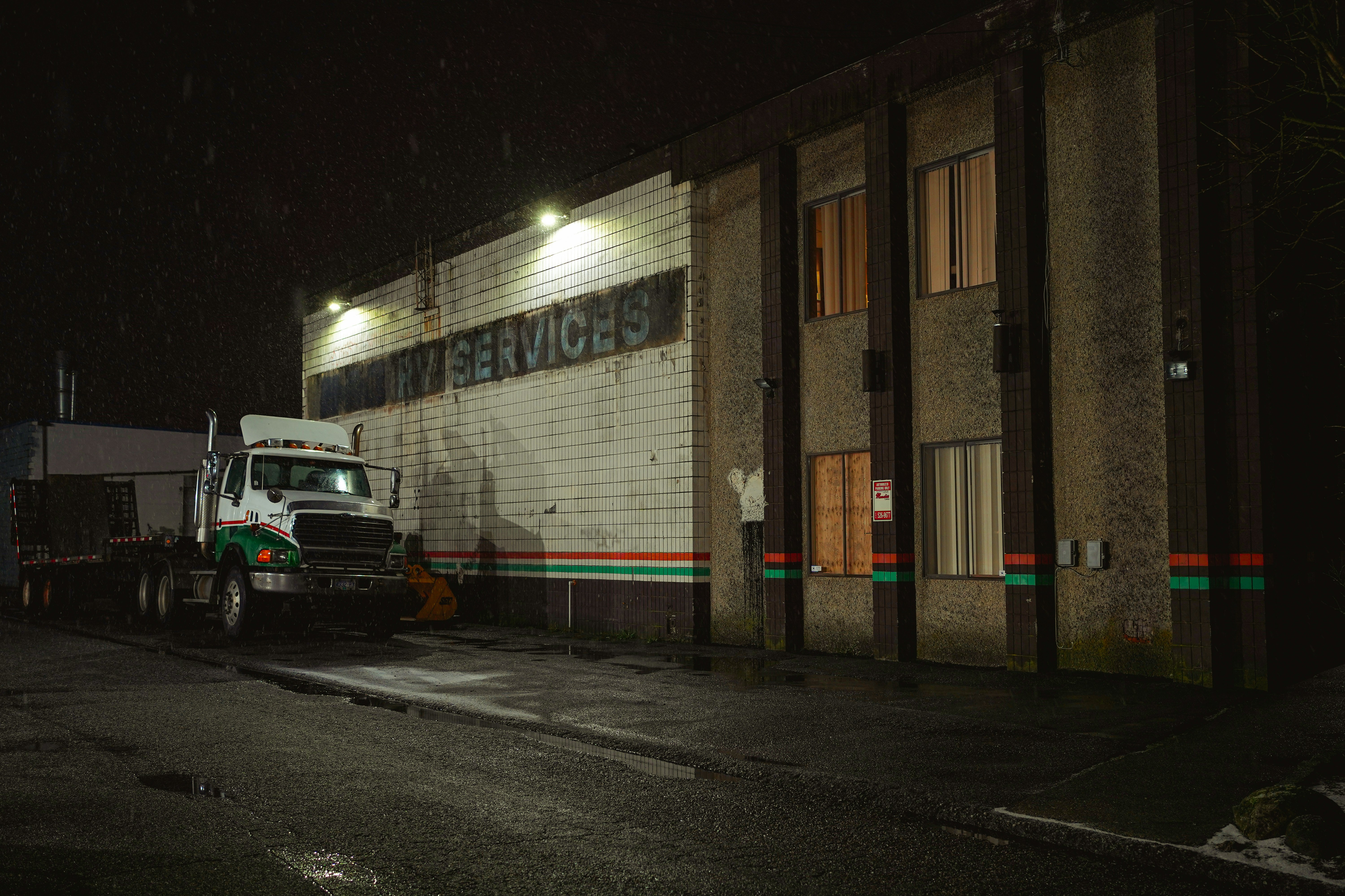 a truck parked outside a building