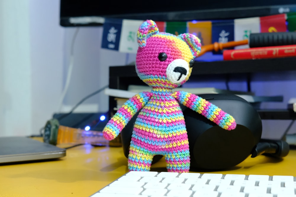 a stuffed animal on a desk