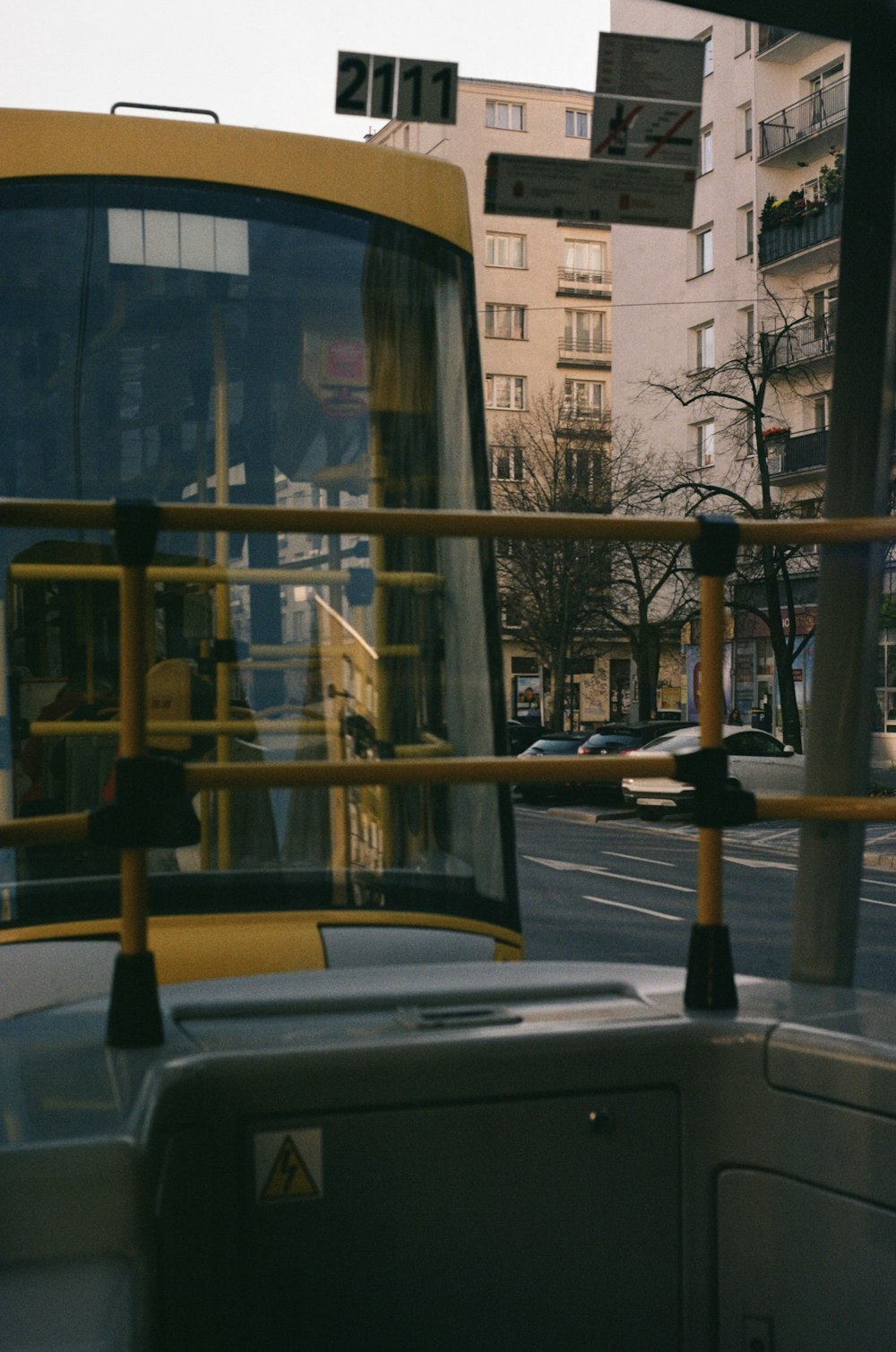 a yellow bus on a street