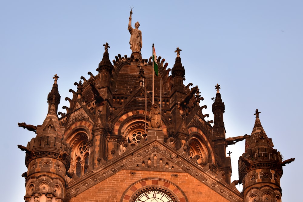 a large ornate building with statues