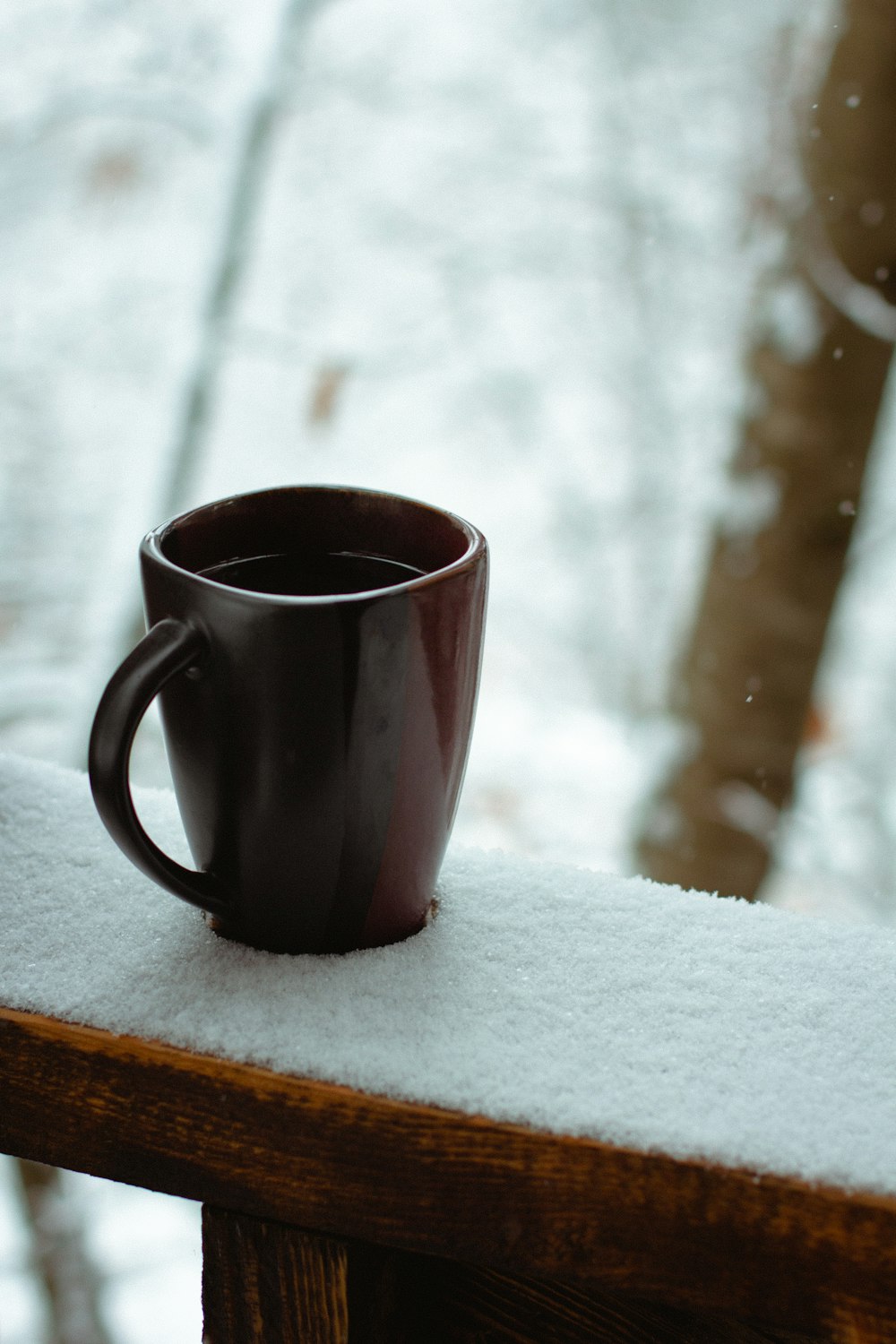 a mug on a window ledge