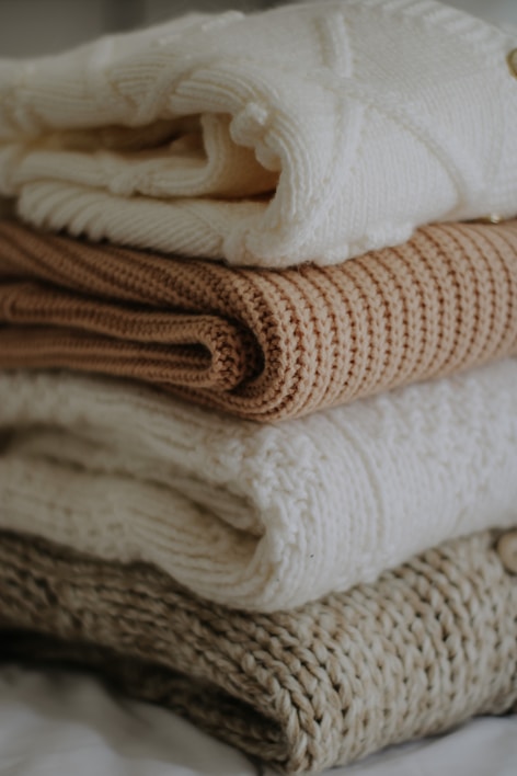 A cozy winter sweater displayed on a neutral background.