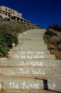 a stone staircase leading up to a building