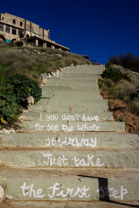 a stone staircase leading up to a building