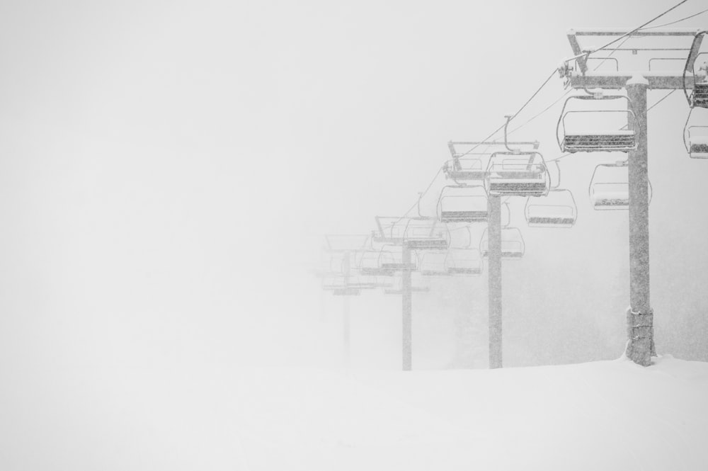 a ski lift in the snow