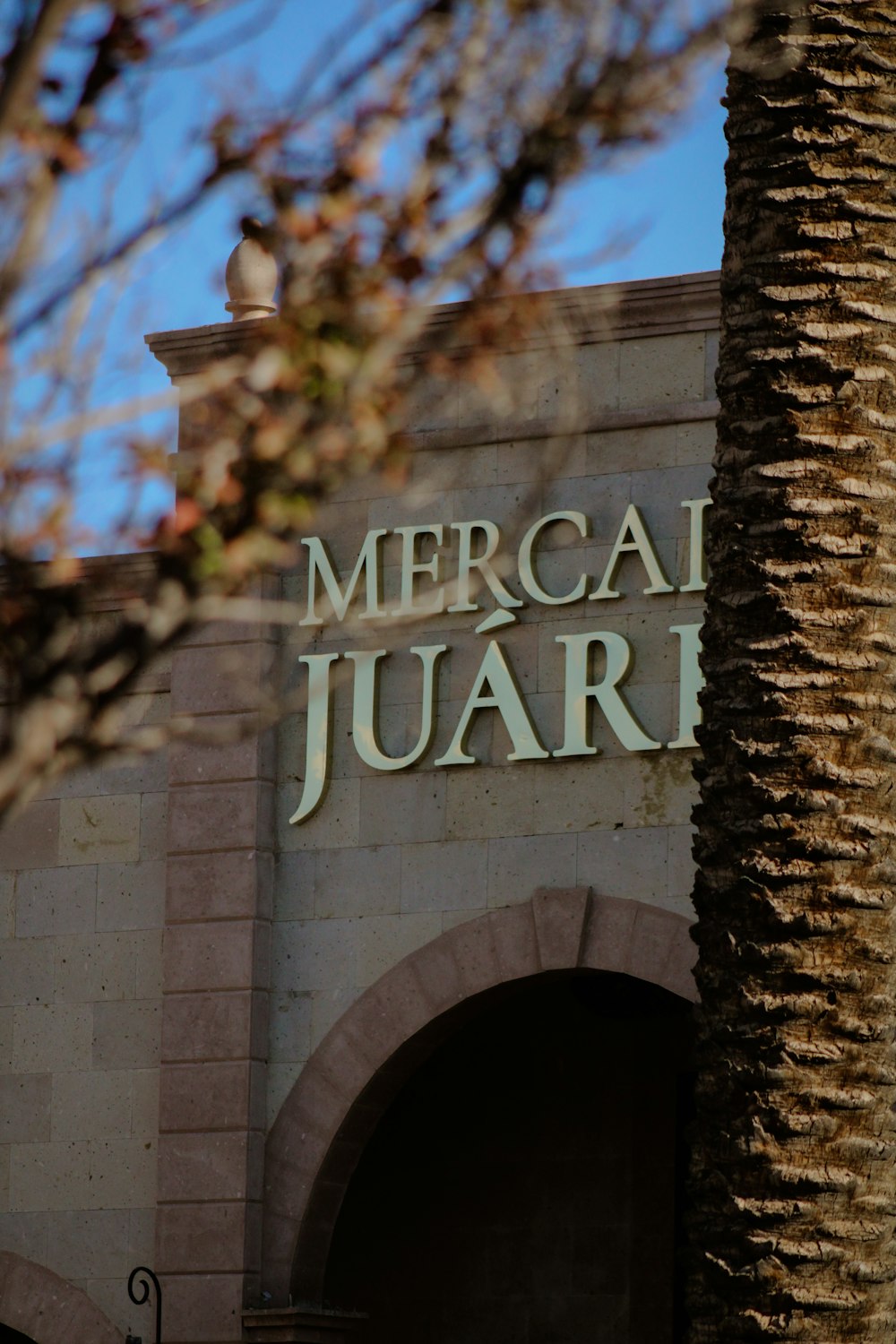 a sign on a brick building