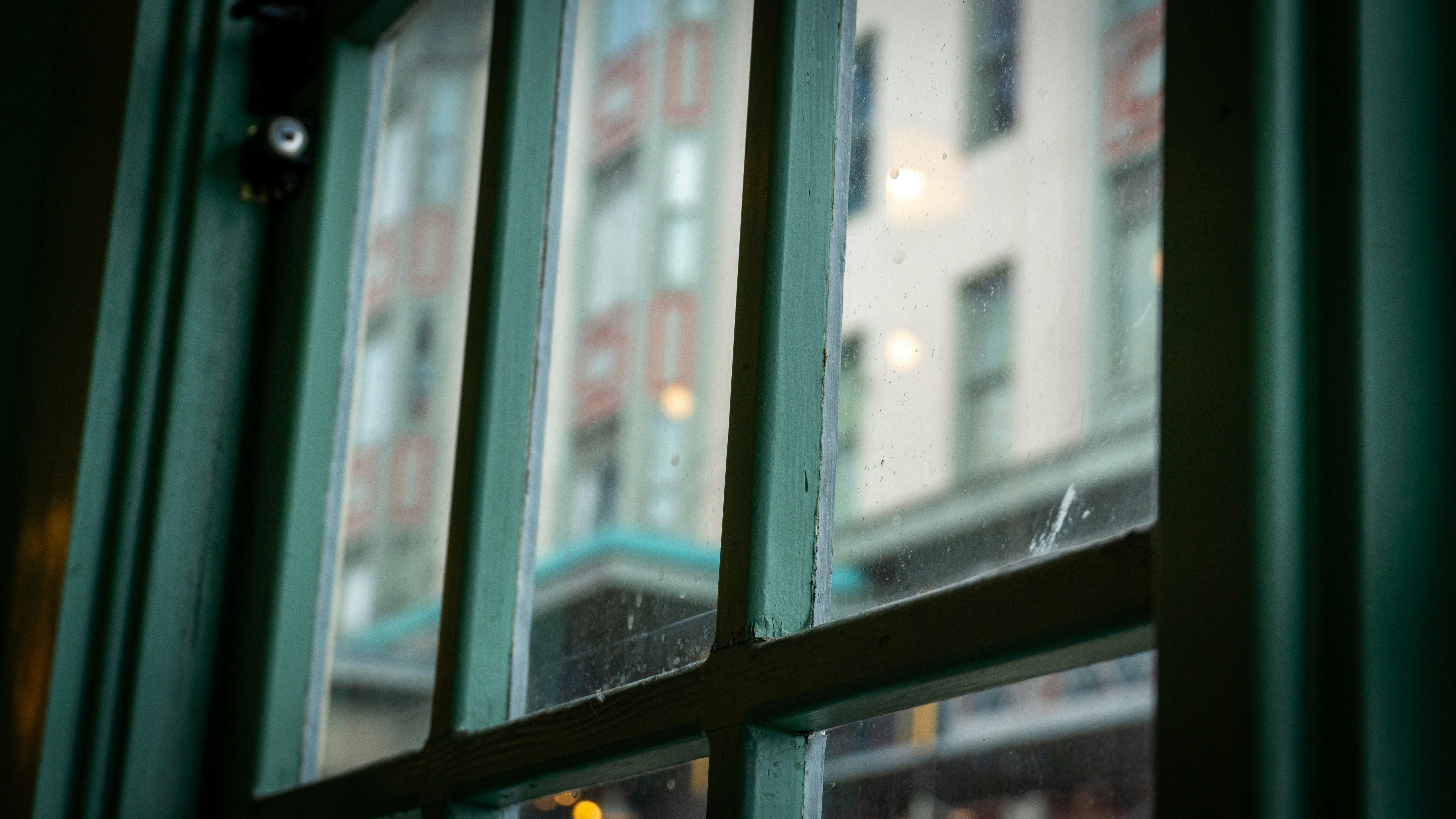 a window with a view of a city