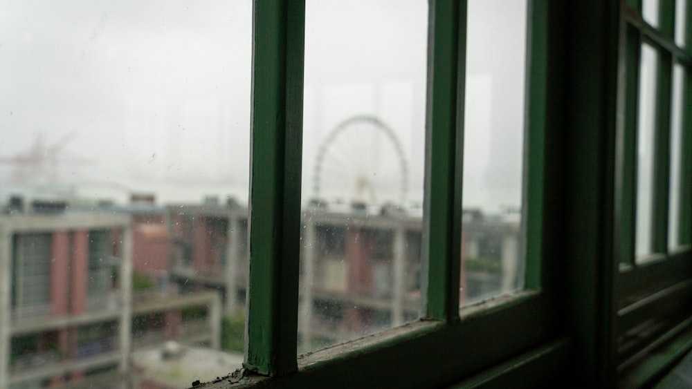 a window with a view of a city