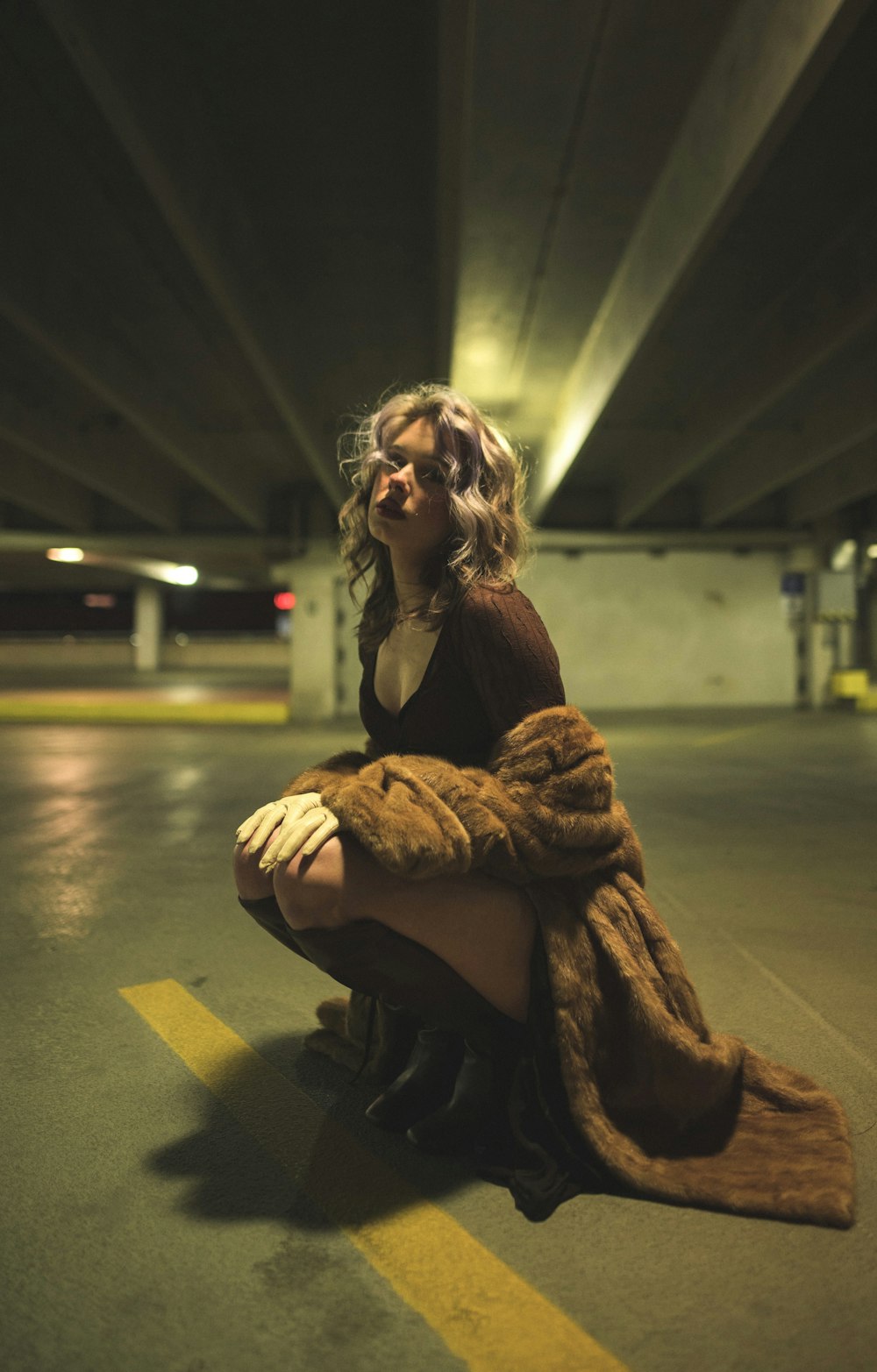 a woman sitting on the ground