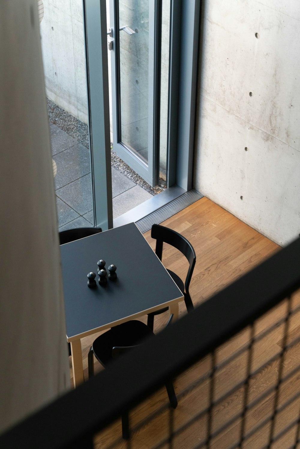 a table with a game board and chairs on it